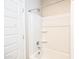 Bathroom featuring walk-in shower with white tiling at 37252 N Big Bend Rd, San Tan Valley, AZ 85140