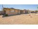 Exterior shot of a home with desert landscaping and a spacious driveway; nice curb appeal at 3825 W Royal Palm Rd, Phoenix, AZ 85051