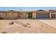 Charming single-story home with a rock lawn, mature landscaping, and a spacious driveway at 3825 W Royal Palm Rd, Phoenix, AZ 85051