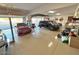 Large garage featuring multiple cars, epoxy flooring, and well organized equipment at 4008 La Ultima Piedra --, Carefree, AZ 85377