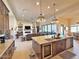 Open concept kitchen featuring an island and view to living room, dining area, and backyard at 4008 La Ultima Piedra --, Carefree, AZ 85377