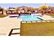 Sparkling pool and spa surrounded by lush landscaping and mountain views create an outdoor oasis for relaxation and entertainment at 4008 La Ultima Piedra --, Carefree, AZ 85377
