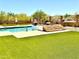 Beautiful backyard oasis with pool, spa, and lush artificial turf at 4008 La Ultima Piedra --, Carefree, AZ 85377