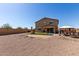 Large backyard with a playground, a gazebo, and a house with covered patio at 40213 W James Ln, Maricopa, AZ 85138