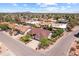 Aerial view of a well-maintained neighborhood showcasing mature trees and single-Gathering homes at 4353 W Villa Rita Dr, Glendale, AZ 85308