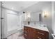 Bright bathroom featuring a modern vanity, tile floors, and a shower-tub combination at 4353 W Villa Rita Dr, Glendale, AZ 85308