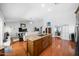 Spacious kitchen view with wooden island and stainless steel appliances. Open floor plan concept at 4353 W Villa Rita Dr, Glendale, AZ 85308