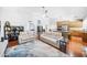 Open-concept living area showcasing hardwood floors, comfortable sofas, and an adjacent kitchen area at 4353 W Villa Rita Dr, Glendale, AZ 85308