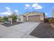 Charming single-Gathering home with a well-maintained lawn, desert landscaping, and an inviting entrance at 4360 N 186Th Ln, Goodyear, AZ 85395