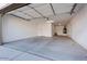 Spacious two-car garage with overhead lighting and ample room for parking and storage at 4360 N 186Th Ln, Goodyear, AZ 85395