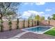 A private backyard pool with desert landscaping, offering a relaxing and serene outdoor experience at 4360 N 186Th Ln, Goodyear, AZ 85395