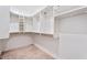Spacious walk-in closet with custom shelving and ample storage space for clothing and accessories at 4360 N 186Th Ln, Goodyear, AZ 85395