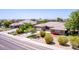 Well-maintained single-Gathering home with a desert landscaped front yard and a two-car garage at 4404 W Olney Ave, Laveen, AZ 85339