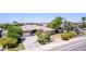 Charming single-story home featuring a well-manicured front yard, a two-car garage, and desert landscaping at 4404 W Olney Ave, Laveen, AZ 85339