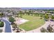 Expansive community park featuring green spaces, a playground, and basketball court, ideal for outdoor activities and recreation at 4404 W Olney Ave, Laveen, AZ 85339