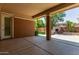 Open patio with a pillar and outdoor living area, perfect for relaxation at 4404 W Olney Ave, Laveen, AZ 85339