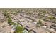 Expansive aerial view of a neighborhood showcasing numerous well-maintained homes and community amenities at 4422 E Spur Dr, Cave Creek, AZ 85331