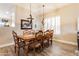Charming dining area featuring a wooden table, upholstered chairs, and ample natural light creates a cozy dining atmosphere at 4422 E Spur Dr, Cave Creek, AZ 85331