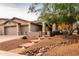 Beautiful, well-maintained single-story home with a three-car garage and desert landscaping at 4422 E Spur Dr, Cave Creek, AZ 85331