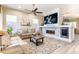 Inviting living room with a fireplace, entertainment center, and modern decor provides a comfortable atmosphere at 4422 E Spur Dr, Cave Creek, AZ 85331