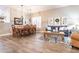 Open-concept living and dining area with stylish decor creates a harmonious and inviting space for gatherings at 4422 E Spur Dr, Cave Creek, AZ 85331