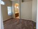 Cozy bedroom with soft carpet, bathed in natural light, offering a tranquil retreat at 4533 E Glenhaven Dr, Phoenix, AZ 85048