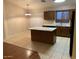 Bright kitchen with an island and stainless steel appliances creating a delightful area to prepare meals at 4533 E Glenhaven Dr, Phoenix, AZ 85048