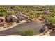 Scenic aerial view of home showcasing desert landscaping in a tranquil neighborhood, including street view at 4605 E Swilling Rd, Phoenix, AZ 85050