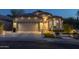 Charming one-story home with landscaped front yard, brick driveway, and a two-car garage at 4605 E Swilling Rd, Phoenix, AZ 85050