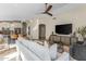 Open concept floor plan with living room flowing into the kitchen, perfect for entertaining at 4605 E Swilling Rd, Phoenix, AZ 85050