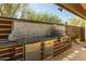 Well-appointed outdoor kitchen with granite countertops, stainless appliances, and a built-in grill at 4605 E Swilling Rd, Phoenix, AZ 85050