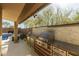 Modern outdoor kitchen with stainless steel appliances, and a built-in BBQ area at 4605 E Swilling Rd, Phoenix, AZ 85050