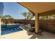 Outdoor area features privacy walls, a pool, and an outdoor seating area, perfect for relaxing at 4605 E Swilling Rd, Phoenix, AZ 85050