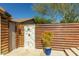 Outdoor shower is beautifully designed with a modern marble surround and sleek fixtures, enclosed by a stylish privacy fence at 4605 E Swilling Rd, Phoenix, AZ 85050