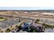 Suburban neighborhood and homes surrounded by roadways, desert landscape and views of distant mountains at 5212 S Seton Ct, Gilbert, AZ 85298