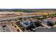 Aerial view of homes in a planned community with easy access to major streets and a beautiful lake at 5212 S Seton Ct, Gilbert, AZ 85298