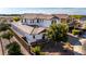 Suburban two-story home surrounded by a lush landscape; a true embodiment of peaceful living and modern style at 5212 S Seton Ct, Gilbert, AZ 85298