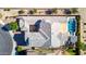 Stunning bird's-eye view showcasing home's backyard pool, courtyard, and meticulous landscaping at 5212 S Seton Ct, Gilbert, AZ 85298