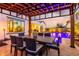 Outdoor patio with pergola and dining table overlooking the pool, perfect for entertaining at 5212 S Seton Ct, Gilbert, AZ 85298
