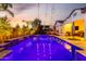 Stunning backyard pool with cascading waterfalls and lush landscaping, great for relaxation and entertainment at 5212 S Seton Ct, Gilbert, AZ 85298