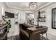 Entertaining home bar featuring a dark wood counter, ample storage, and an open layout for socializing at 5212 S Seton Ct, Gilbert, AZ 85298