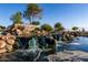 A picturesque community entrance sign and water feature welcomes residents and visitors at 5212 S Seton Ct, Gilbert, AZ 85298