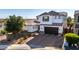 Beautifully landscaped single Gathering home features stucco, stone accents and an attached garage at 5212 S Seton Ct, Gilbert, AZ 85298