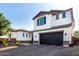 Charming two-story home featuring stone accents, a two car garage, and mature landscaping at 5212 S Seton Ct, Gilbert, AZ 85298