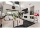 Inviting living room with a fireplace, high ceilings, and sliding glass doors to bring the outside in at 5212 S Seton Ct, Gilbert, AZ 85298
