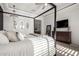 This main bedroom features a four poster bed, neutral color palette and comfortable atmosphere at 5212 S Seton Ct, Gilbert, AZ 85298
