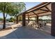 Shaded picnic pavilion with multiple tables, perfect for community gatherings and outdoor dining at 5212 S Seton Ct, Gilbert, AZ 85298