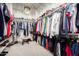 This walk-in closet features ample storage space for clothing, shoes and accessories at 5212 S Seton Ct, Gilbert, AZ 85298