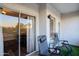 Enjoy outdoor living on this cozy balcony with comfortable seating and sunset views at 5345 E Van Buren St # 307, Phoenix, AZ 85008