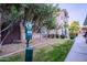 Well-maintained dog waste station near apartments with lush landscaping and mature trees at 5345 E Van Buren St # 307, Phoenix, AZ 85008